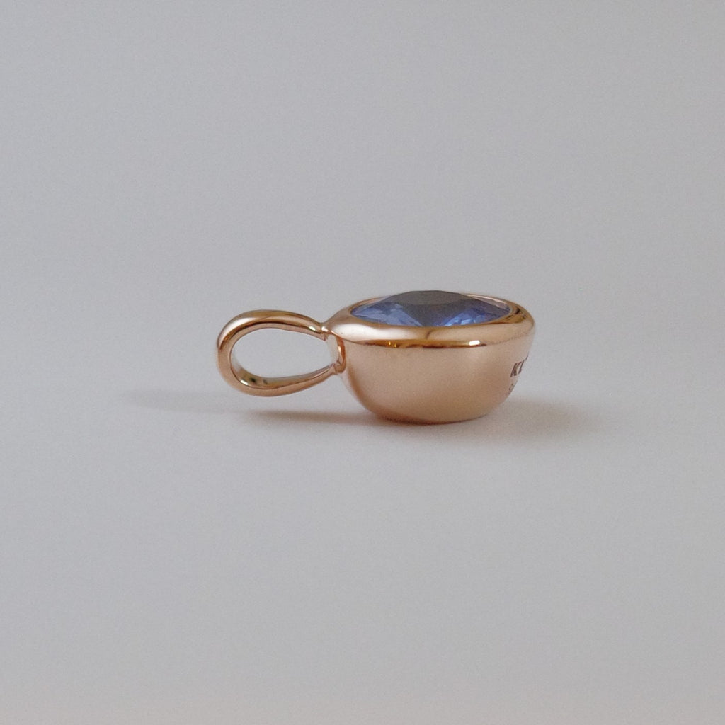 Side view of sapphire pendant