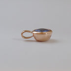 Side view of sapphire pendant
