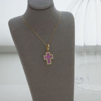Pink sapphire cross pendant in 18Kgold 